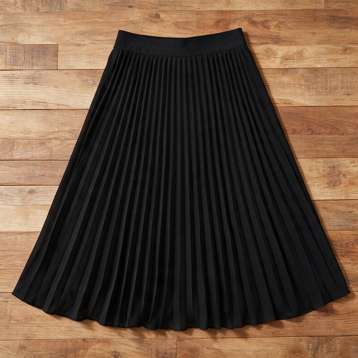 Ponsonby Lane pleated midi skirt in Black – flat lay, pleats visible from above